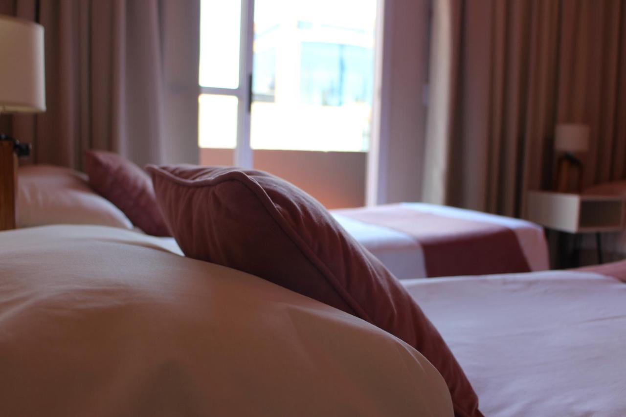 Hotel City بوساداس المظهر الخارجي الصورة