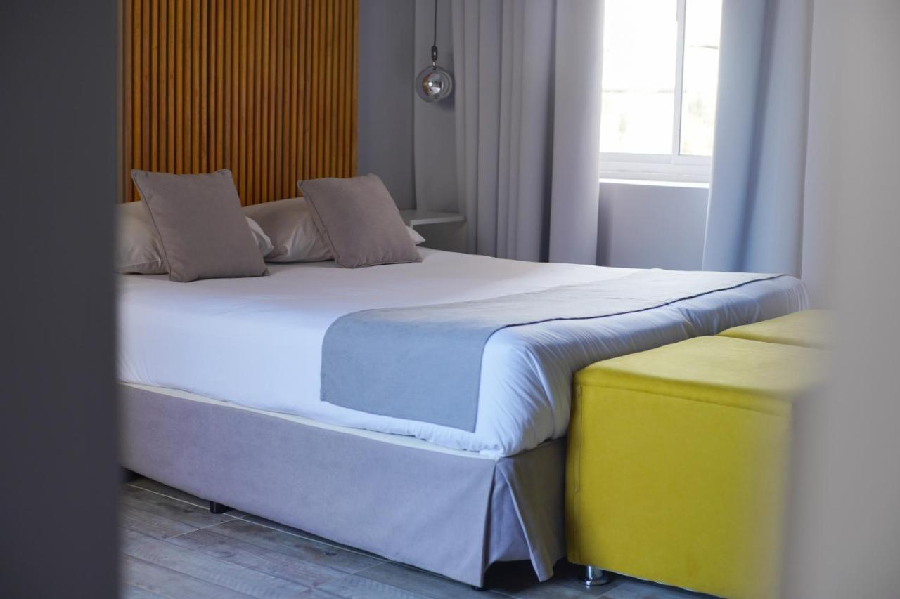 Hotel City بوساداس المظهر الخارجي الصورة